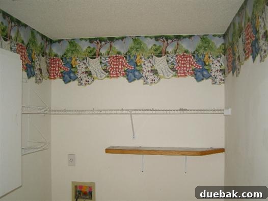 Old-fashioned room with busy floral wallpaper border