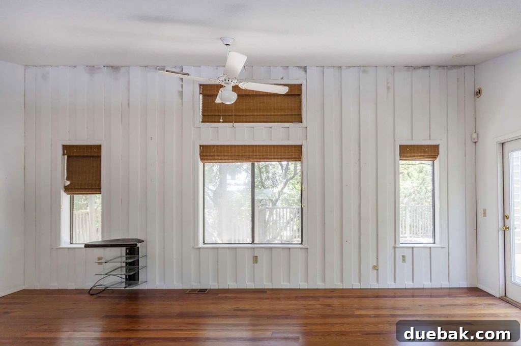 Before View of Upstairs Family Room with Mildewed Ceiling
