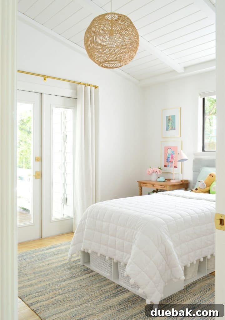 Daughter's Bedroom After Renovation with Vaulted Planked Ceiling and DIY Headboard