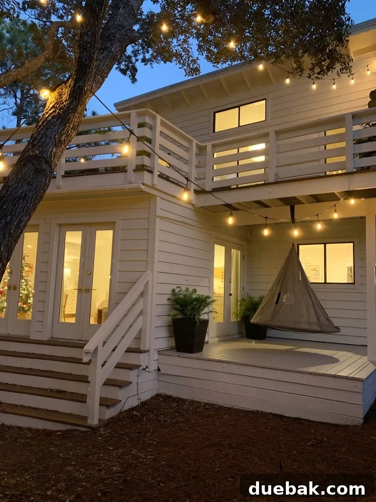 Renovated Covered Porch with Hanging Swing and Fresh Paint