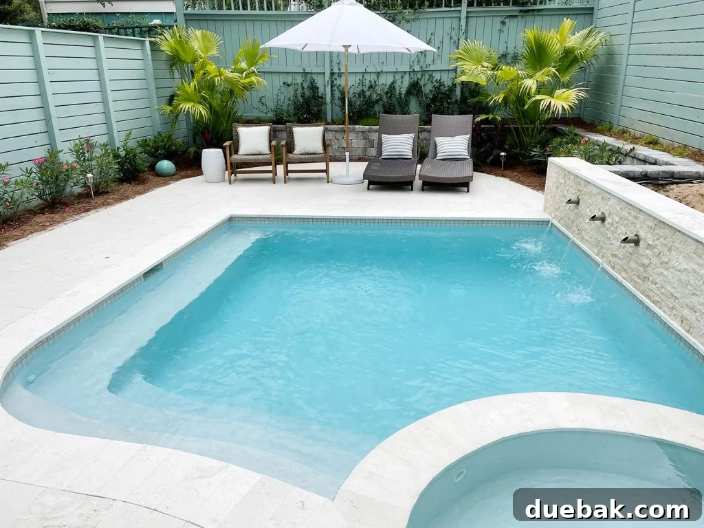 Renovated Backyard with Pool, Retaining Wall, Fountains, and Landscaping