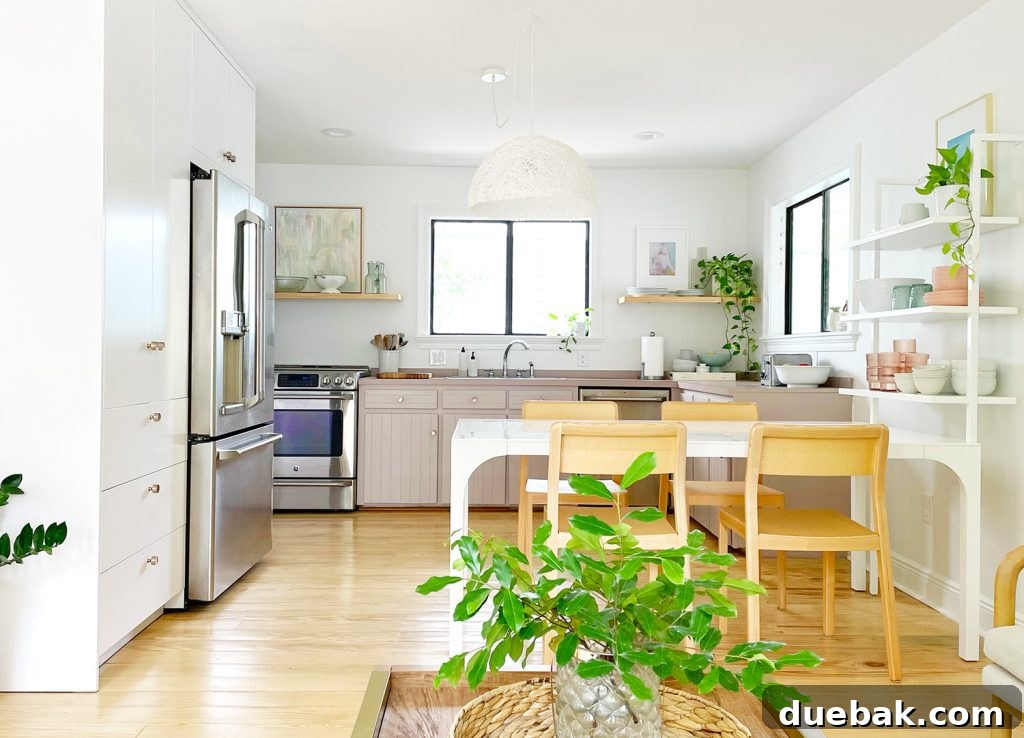Modern White and Mauve Kitchen with Refinished Floors