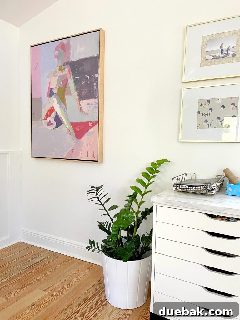 Painting Artwork Hung By Upstairs Family Room Kids Art Desk With ZZ Plant