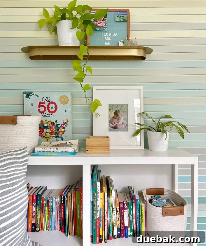 Shelf Detail Of Built In Bookcase Full Of Books And Toys
