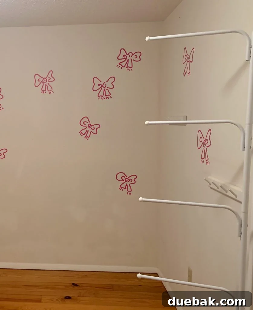 Before photo of Boys Bedroom With Painted Bow Mural On White Walls