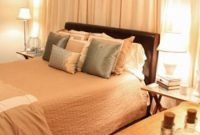 Bedroom Makeover: Bed Framed by Curtains and Flanked Closets