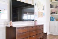 How to Arrange Picture Frames Around a TV for a Polished Look