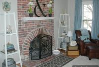 Cozy Family Room with Brick Fireplace and Blue Curtains