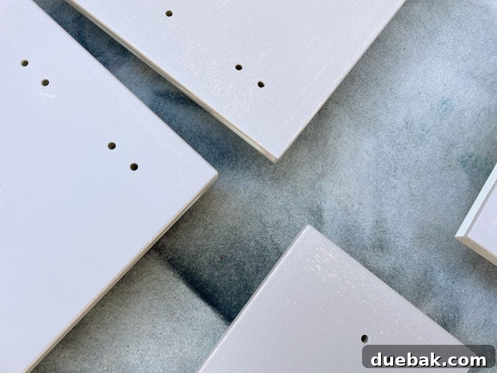 Close Up On Patching First Coat Of Painted Ikea Cabinet Fronts