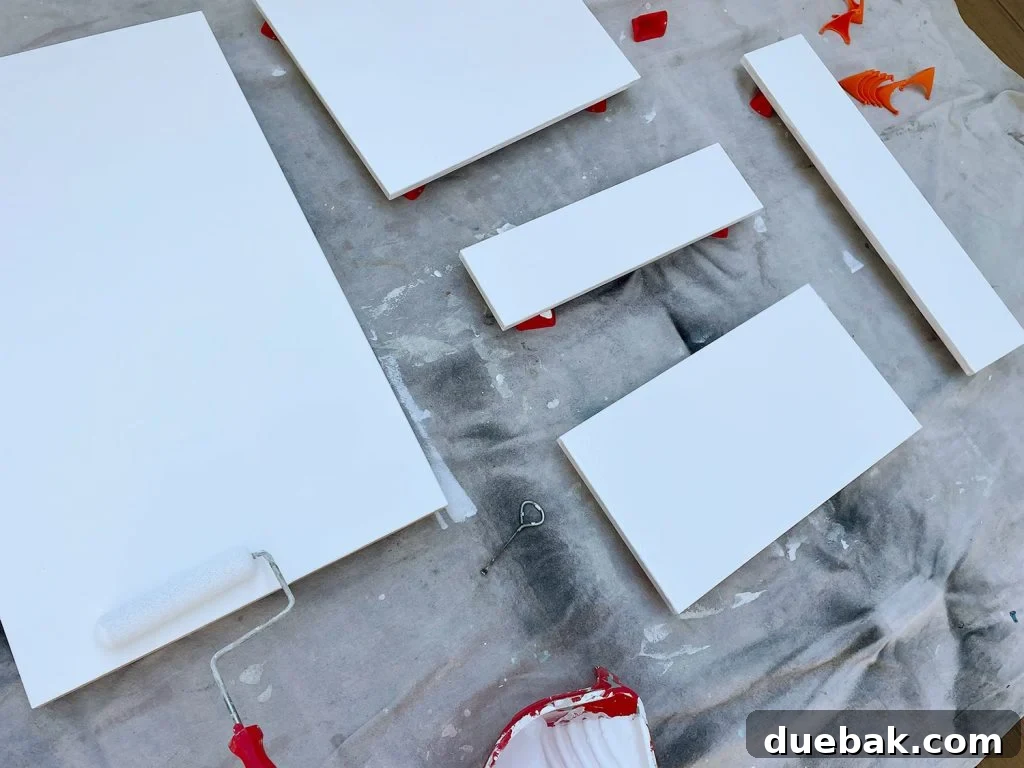 Applying Primer To Ikea Kitchen Cabinet Doors With Foam Roller