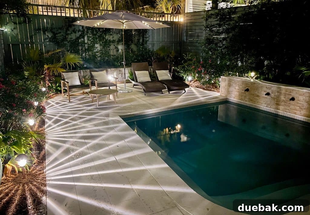 Outdoor Solar Lights: Top Picks for Bright, Long-Lasting Illumination 3 Backyard Pool Illuminated with LED Solar Pathway Lights