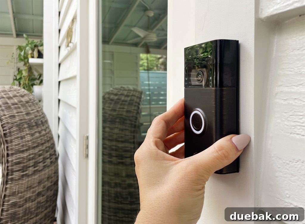 Outdoor Solar Lights: Top Picks for Bright, Long-Lasting Illumination 15 Hand Placing Ring Video Doorbell Onto Mount