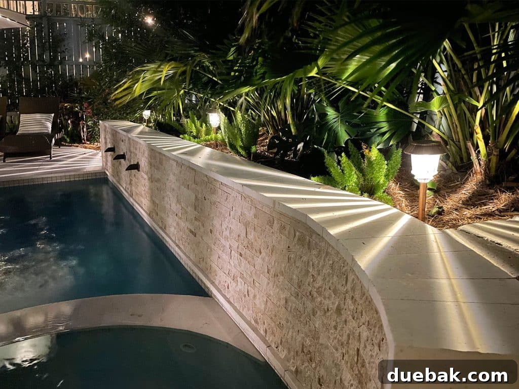 Outdoor Solar Lights: Top Picks for Bright, Long-Lasting Illumination 4 LED Solar Pathway Lights Along Retaining Wall Near Backyard Pool