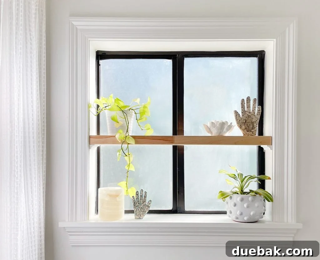 Frosted Bathroom Window With Floating Wood Shelf In Sill