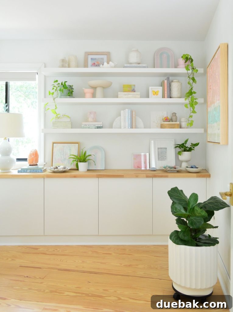 Three Ikea Lack Floating Shelves Over Ikea Besta Storage Console With Butcher Block Counter