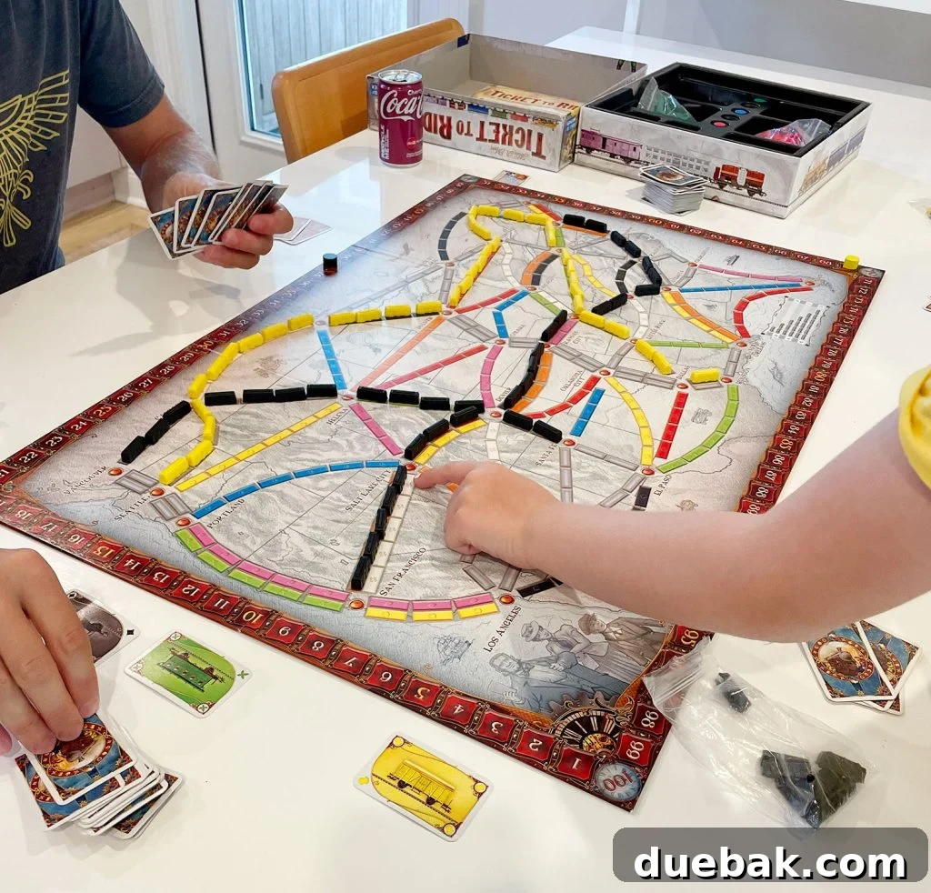 Family Playing Ticket To Ride Original Version