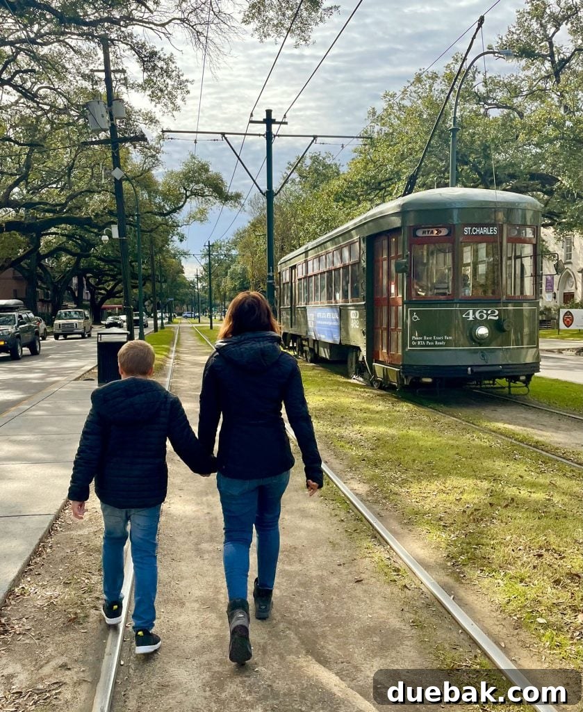 Mom And Child Walking Near New Orleans Street Car