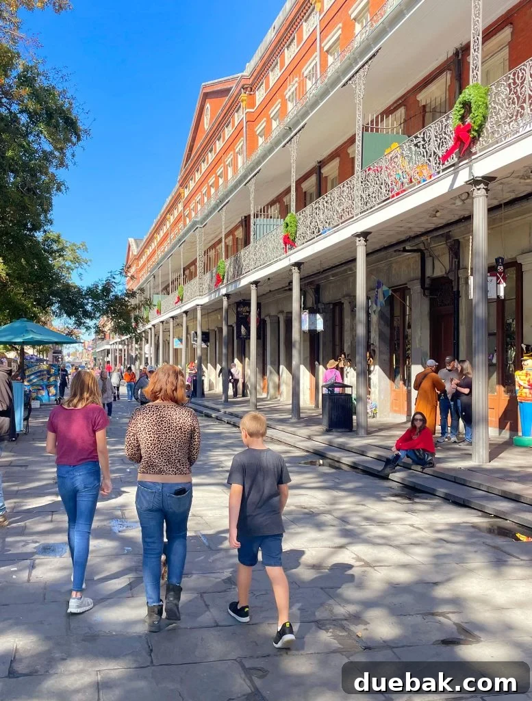 Mom And Kids Walking In French Quarter New Orleans