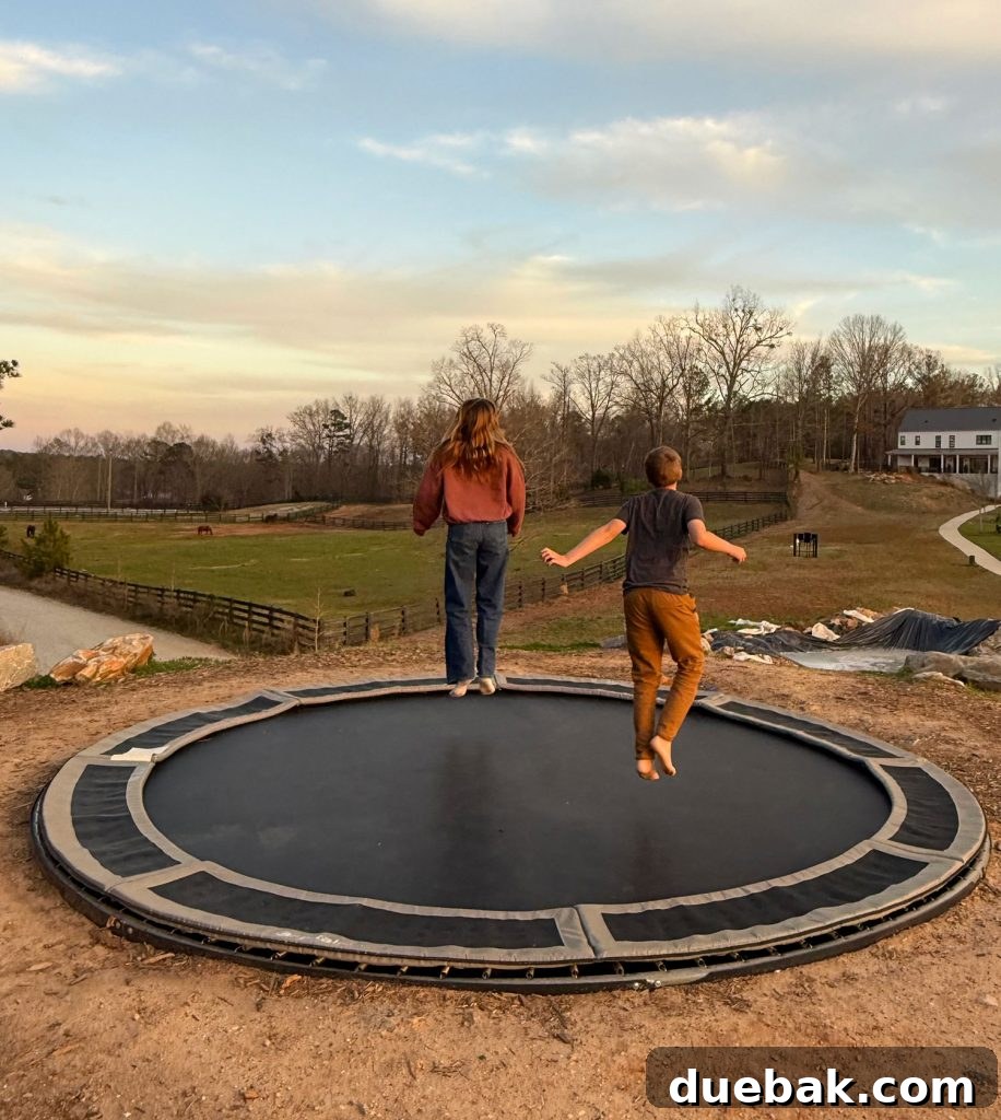 A Weekend Getaway in Serenbe, Georgia: What to See and Do 7 Kids Jumping On In Ground Trampoline in Serenbe Georgia