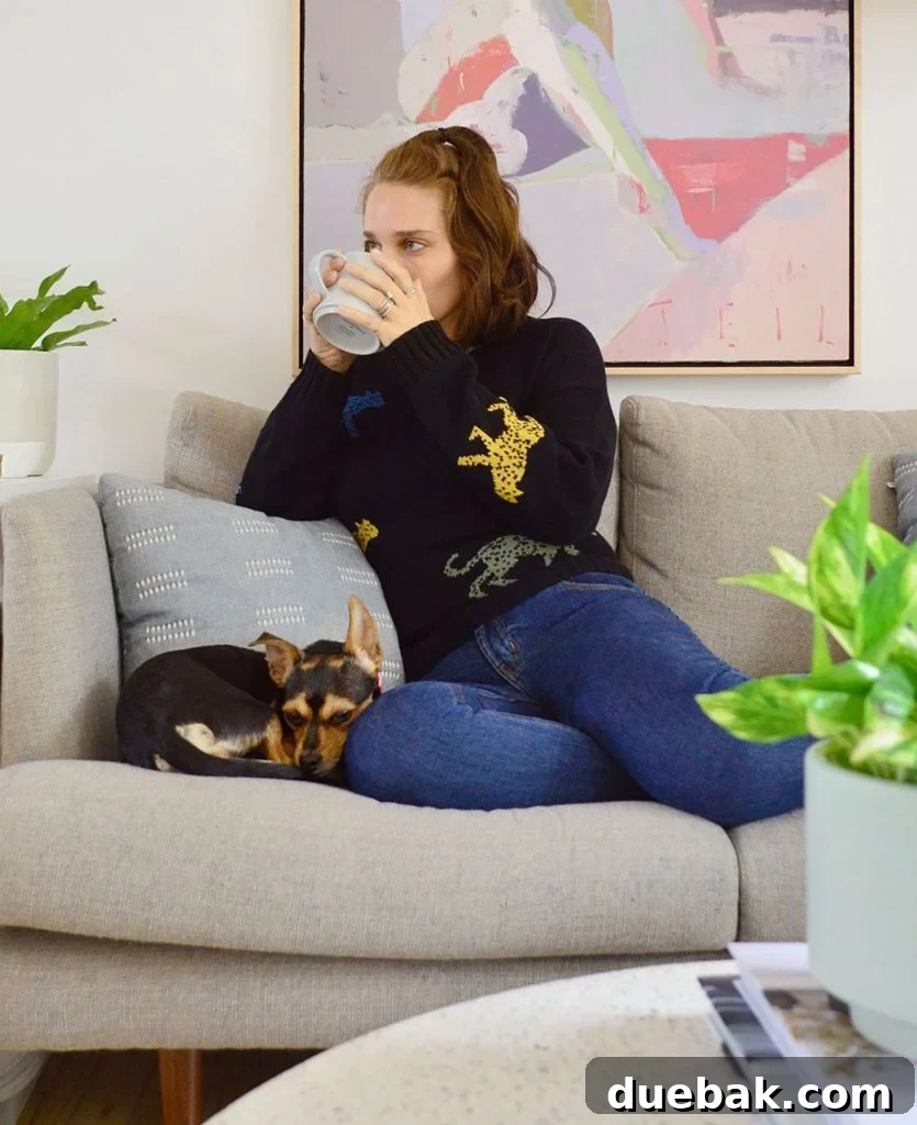 Sherry Sitting With Penny Dog On Couch Drinking Coffee