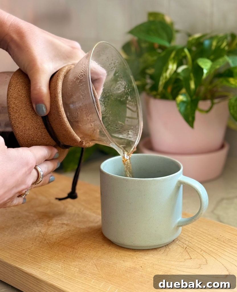 Pouring Pour Over Coffee Into Mug