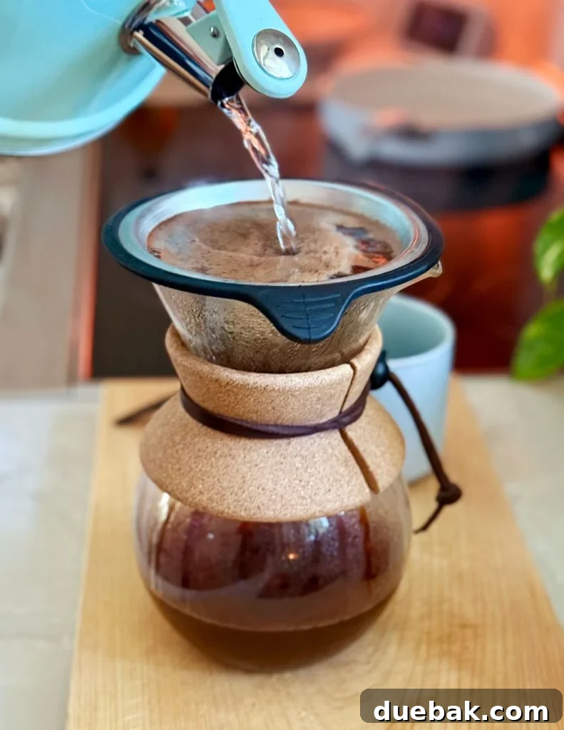 Pouring Boiled Water Into Pour Over Coffee Maker