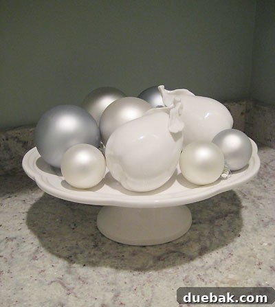 Kitchen display Ornaments and ceramic pears on cake stand