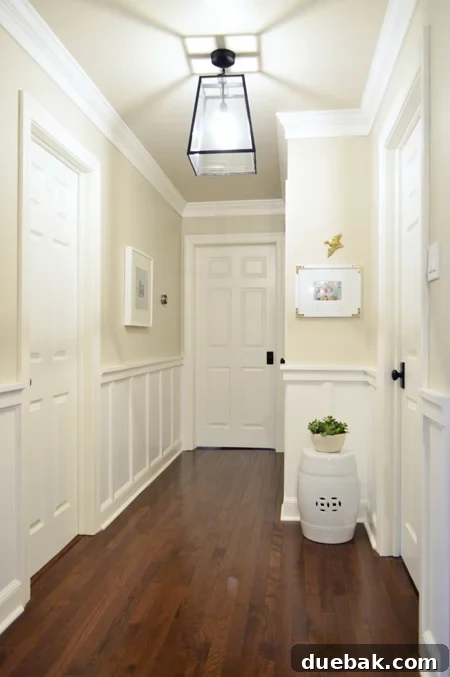 DIY Hallway Molding Project With Fancy Wainscoting Detail