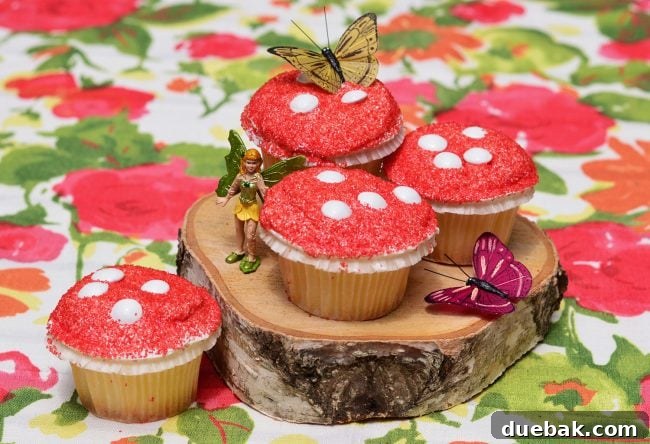 Toadstool cupcakes on wood slice