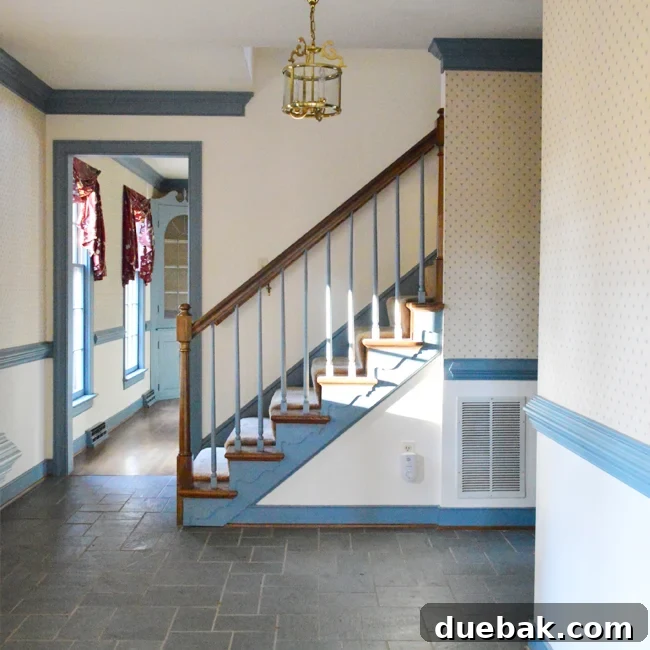 Foyer Makeover: Stylish Lighting and Furniture Updates 3 HouseTour-Before-Stairs