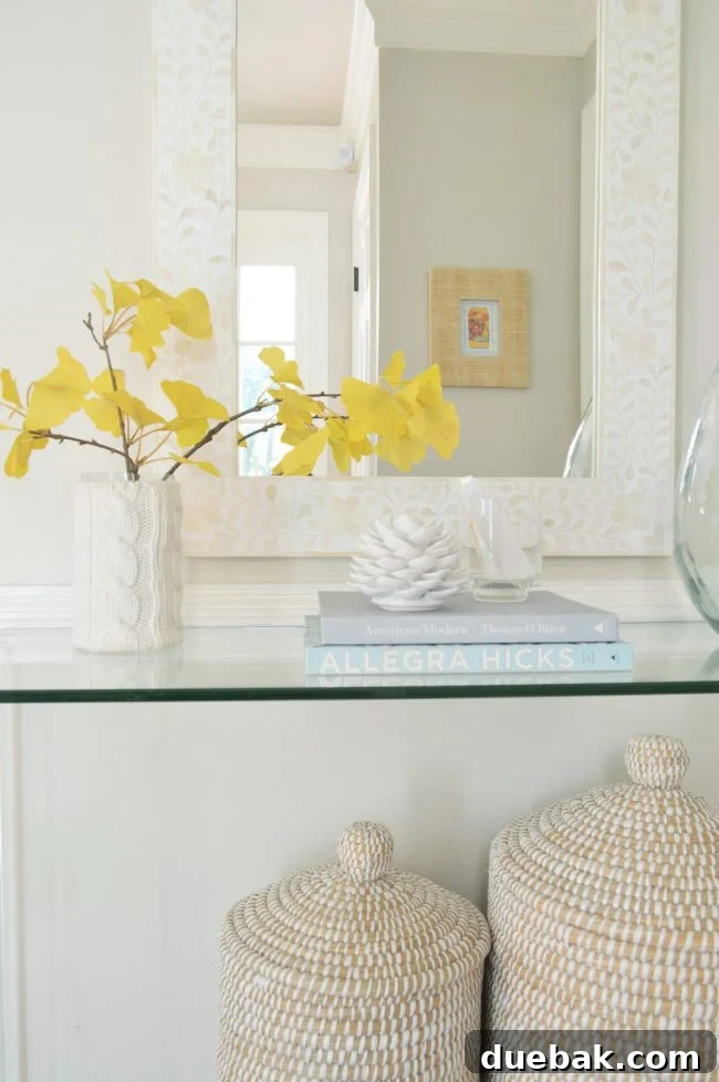 Foyer Makeover: Stylish Lighting and Furniture Updates 7 neutral foyer fake gingko branch decor