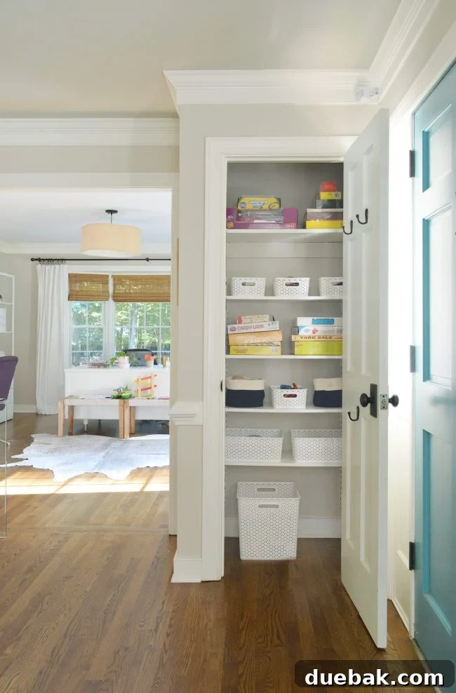 Foyer Makeover: Stylish Lighting and Furniture Updates 10 neutral foyer kids game closet
