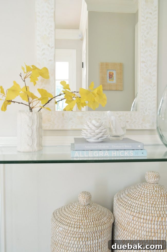 neutral foyer fake gingko branch decor