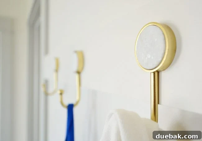 detail photo of marble circle insert on gold hook from target