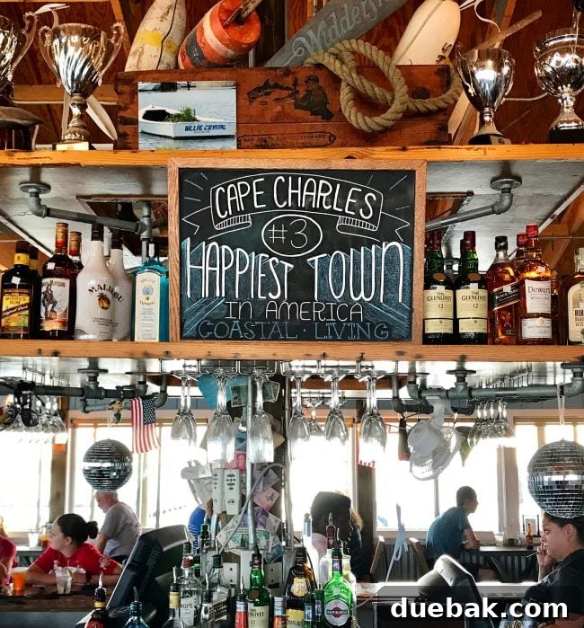 Cape Charles, VA: Your Guide to the Charming Beach Town 4 sign showing cape charles is happiest town in america by coastal living