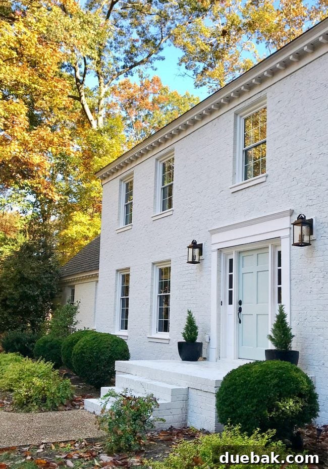 How We Transformed Our Brick House with White Paint 2 White Paint Brick Home With Open Front Porch