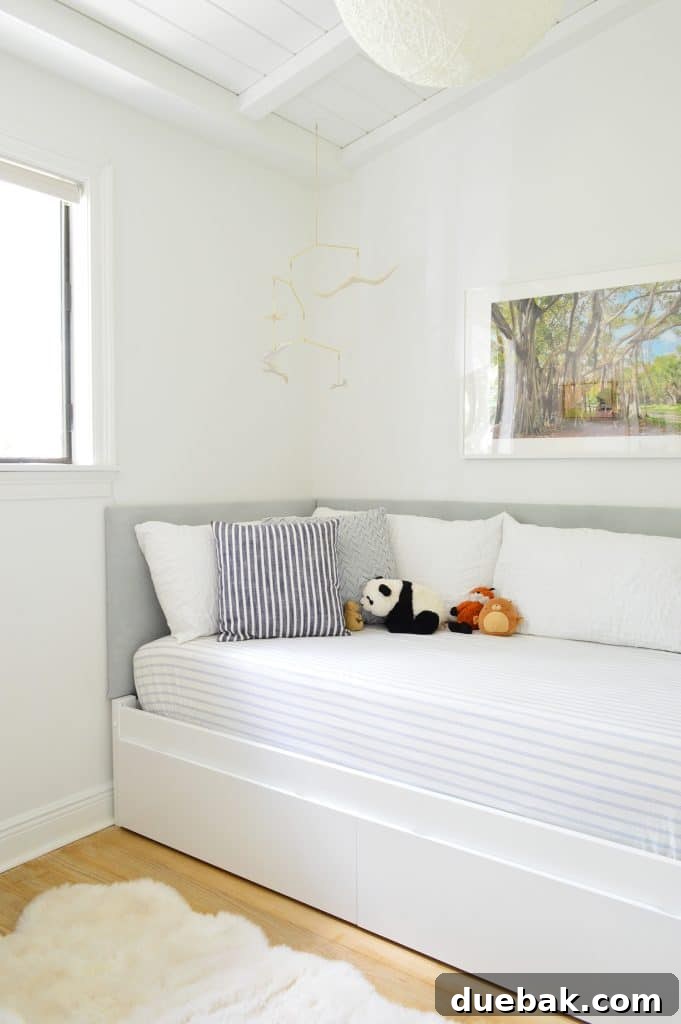DIY Headboard Ideas: Simple Projects for a Stylish Bedroom 14 After photo of DIY upholstered headboard on two sides of boys bedroom with built-in daybed