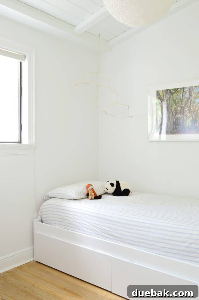 DIY Headboard Ideas: Simple Projects for a Stylish Bedroom 3 Before photo of boys bedroom with daybed and blank walls