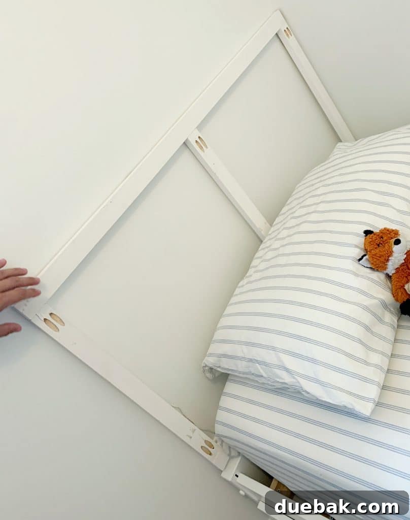 DIY Headboard Ideas: Simple Projects for a Stylish Bedroom 5 Test fitting frame constructed for DIY headboard before attaching fabric