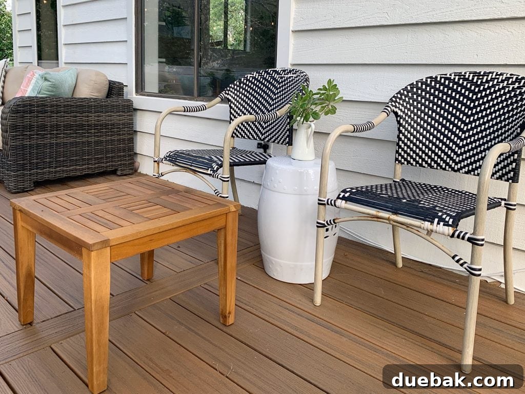 Black And White Woven Outdoor Chairs With Bits Of Rust