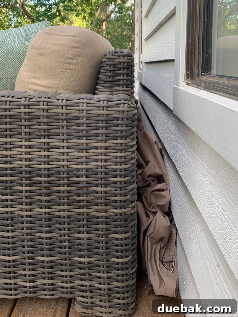 Sun Sail Cover Stuffed Behind Outdoor Sofa
