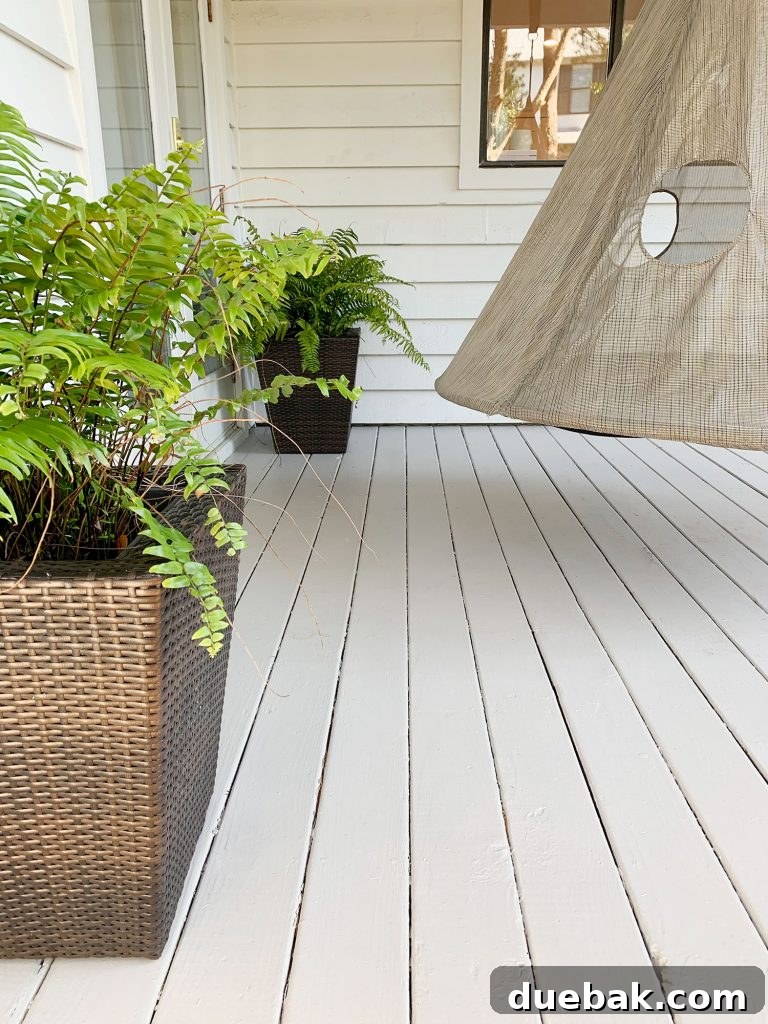 How to Paint a Porch Floor: Step-by-Step Guide for Lasting Results 7 Finished painted gray porch floor detail