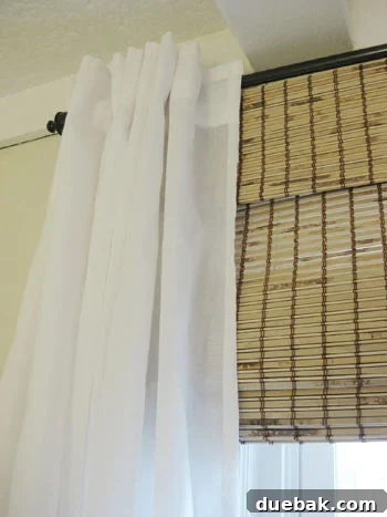 curtain-and-bamboo-roman-shade-detail-photo